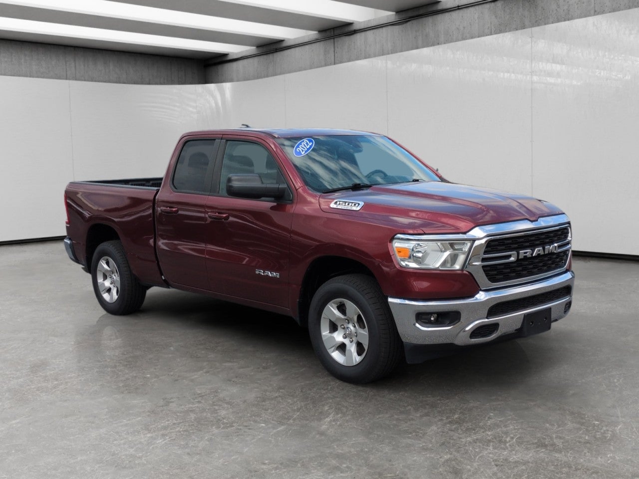 2022 RAM 1500 Big Horn in Red — front three-quarter view