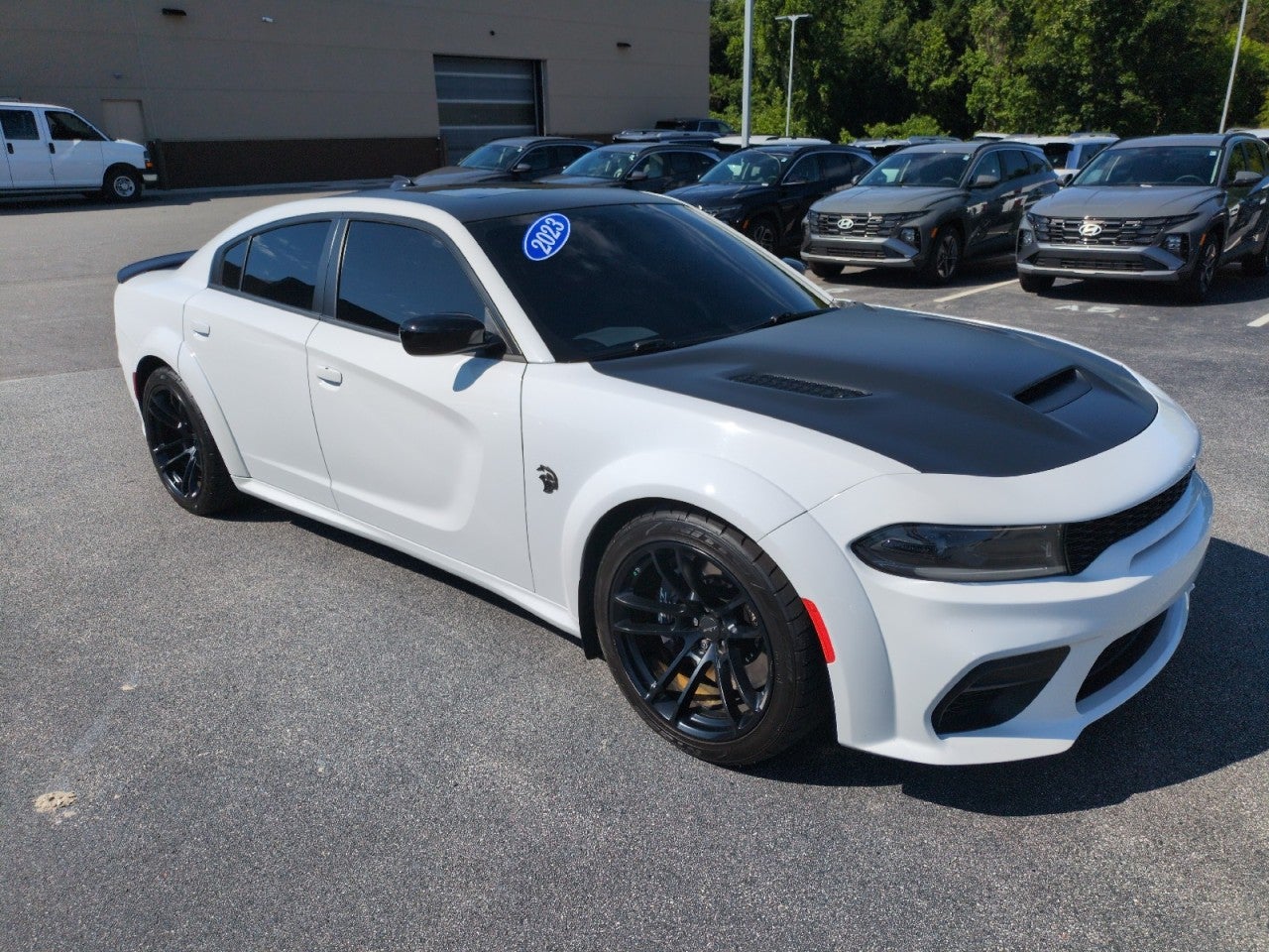 2023 Dodge Charger SRT Hellcat Widebody Jailbreak in White — front three-quarter view