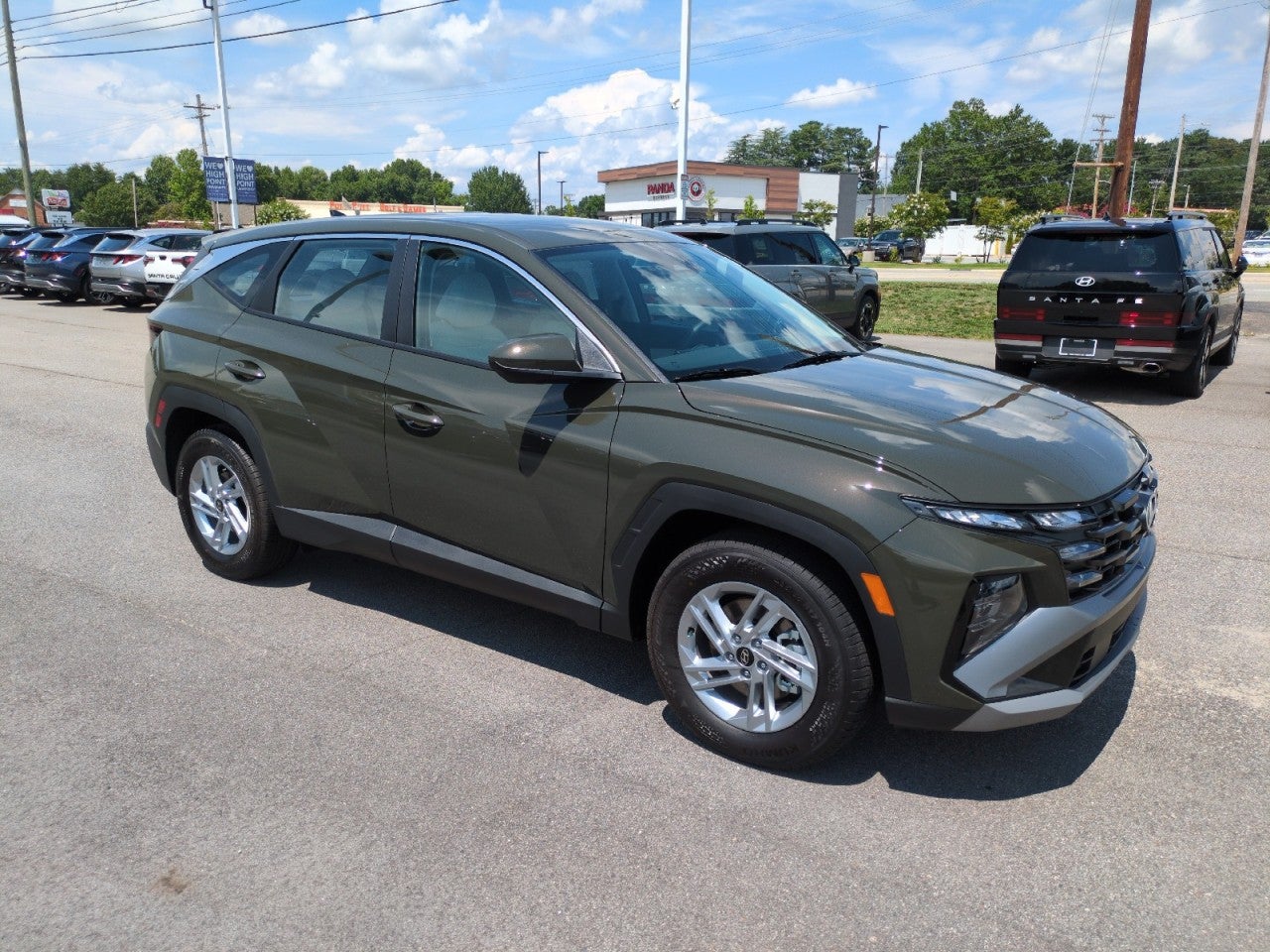 2026 Hyundai TUCSON SE FWD in Green — front three-quarter view