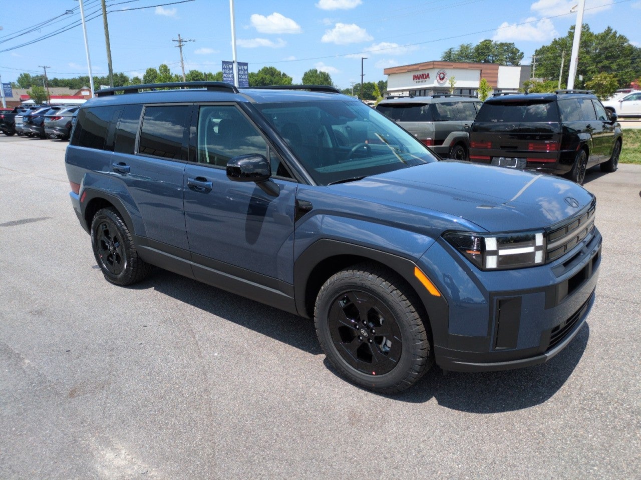 2026 Hyundai SANTA FE XRT AWD in Blue — front three-quarter view